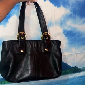 This is a Coach bag / hand or shoulder bag